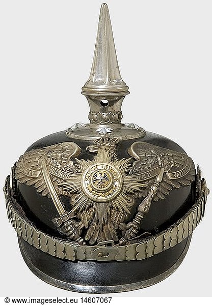 A helmet for Prussian officers  of the II/III Battalions  1st Foot Guard Regiment Fibre body with silver-coloured fittings. Guard eagle with the partially enamelled Star of the Order of the Black Eagle. Chin scales and star screws (renewed?) silvered  fluted spike  officer's cockades  silk liner. historic  historical  19th century  Prussian  Prussia  German  Germany  militaria  military  object  objects  stills  clipping  clippings  cut out  cut-out  cut-outs  helmet  helmets  headpiece  headpieces  utensil  piece of equipment  utensils  protection  headgear  headgears  uniform  uniforms