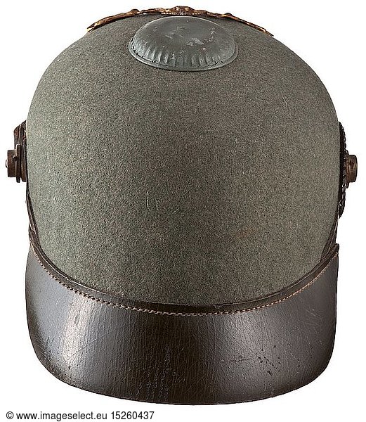 A helmet M 1900 for enlisted men of the East Asia Expeditionary Corps  depot piece  circa 1900 Leather skull with green felt cover  the visors and lateral reinforcements made of green leather. On the front imperial eagle plate in the version used for tropical helmets. Brown leather chinstrap with brass fittings on button 91  the imperial cockade on the right. Instead of the usual spike the helmet M 1900 has a screwed cap (green lacquered) on top. Black leather liner with loops  manufacturer's stamp 'H. Hoffmann  Berlin' (barely legible) inside the skull. Signs of age and usage. Extremely rare helmet in good  untouched original condition. An identical item can be seen in the reference book 'The German Colonial Troops' by Kraus/MÃ¼ller. historic  historical  navy  naval forces  military  militaria  branch of service  branches of service  armed forces  armed service  object  objects  stills  clipping  clippings  cut out  cut-out  cut-outs  20th century