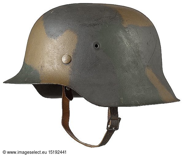 A helmet M 42 of the coastal artillery with camouflage paint The skull with the original field-grey rough camouflage lacquer of the Kriegsmarine  over which is a brown-green camouflage colouring  the inside with a stamping '1746' on the nape. Complete with liner and RB-number-stamped chin strap. Size 56. According to the consignor  the helmet derives from a bunker position of the coastal artillery in Denmark. historic  historical  navy  naval forces  military  militaria  branch of service  branches of service  armed forces  armed service  object  objects  stills  clipping  clippings  cut out  cut-out  cut-outs  20th century