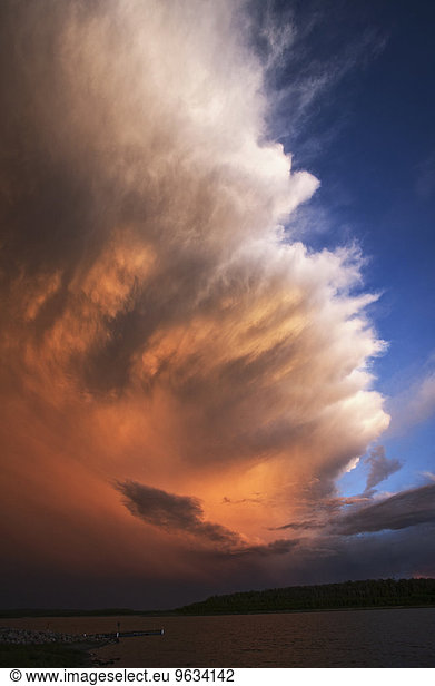 A high cloud formation  a storm cloud reflecting sunlight.
