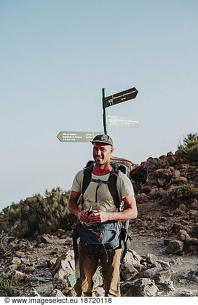 A hiker in the crossroad of the Guajara mountain in El Teide