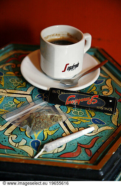 A joint and a cup of coffee at a Coffee shop  Amsterdam  Holland.