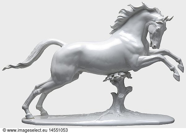 A jumping horse  design by Prof. Theodor KÃ¤rner  model number '74'. White  glazed porcelain  pressmark 'SS'  model number '74' and signature on the bottom. One hoof restored(?)  one ear minimally chipped. Height 36 cm. Length ca. 55 cm. historic  historical  1930s  1930s  20th century  object  objects  stills  clipping  clippings  cut out  cut-out  cut-outs