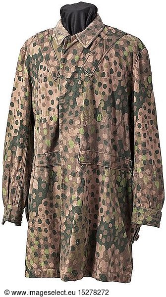 A 'Knochensack' in 'Erbstarn' camouflage pattern. Cotton cloth production from circa 1944  one side imprinted with 'Erbstarn' (pea dot) camouflage pattern. Covered button fly  Bakelite buttons (a few buttons missing)  no zippers (flaps are sewn up)  the sleeves with Prym push buttons  the reverse with a stitched-on pistol holster. Distinct marks from an SS eagle on the right of the front side. Grey inner liner. Doubtlessly an original piece and definitely one of the rarest SS uniform items  in obviously worn condition. historic  historical  20th century  1930s  1940s  Waffen-SS  armed division of the SS  armed service  armed services  NS  National Socialism  Nazism  Third Reich  German Reich  Germany  military  militaria  utensil  piece of equipment  utensils  object  objects  stills  clipping  clippings  cut out  cut-out  cut-outs  fascism  fascistic  National Socialist  Nazi  Nazi period