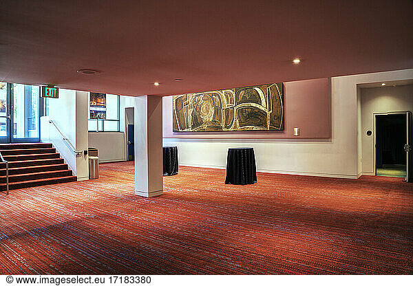 A large open space in a hospitality or business venue  conference centre hotel  public space.