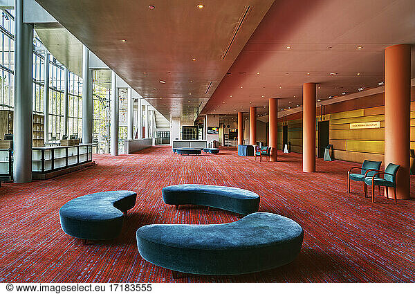 A large open space in a hospitality or business venue  conference centre hotel  public space.