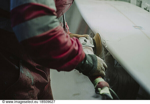 A local surf shaper from Tenerife working on a new surfboard
