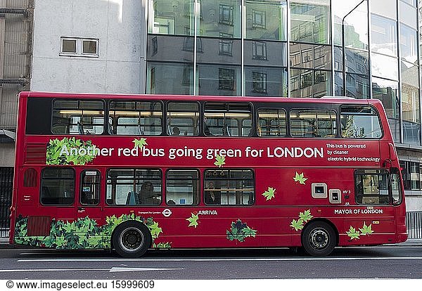 A London bus carries advertising to promote the city's green energy initiatives.