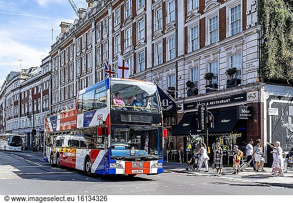 A London Tour Bus Near Buckingham Palace  London  England.