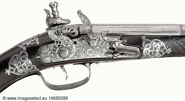 A long flintlock pistol  Brescia  circa 1690. Two-stage barrel  octagonal breech section  then round with smooth bore in 13.5 mm caliber. A stamped  slightly worn inscription  'Vicenzo Cominazzo' on the breech. The lock is finely engraved with decorative flowers. The frizzen lid is an old replacement. Full stock with engraved open work decorative iron mountings. Iron furniture engraved with decorative flowers. Original wooden ramrod with flat iron jag. Length 52.5 cm. historic  historical  17th century  civil handgun  civil handguns  handheld  gun  guns  firearm  fire arm  firearms  fire arms  weapons  arms  weapon  arm  object  objects  stills  clipping  clippings  cut out  cut-out  cut-outs