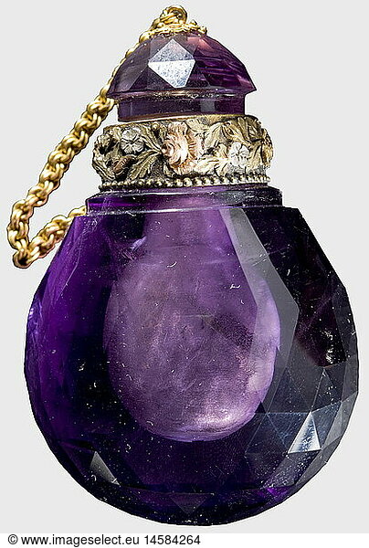 A magnificent amethyst flacon  presumably a Russian jeweller's work  circa 1860/70 The amethyst facetted in a fine diamond cut. The collar of yellow  white and rose gold is entirely covered with finely chased floral decoration. The stopper is attached with a small gold chain. Height 54 mm. Wonderful craftsmanship. Provenance: Grand Duchess Olga Nikolaevna Romanova (1822 - 1892). historic  historical  19th century  vessel  vessels  object  objects  stills  clipping  clippings  cut out  cut-out  cut-outs