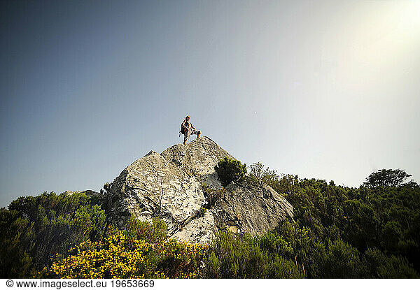 A man finishes his hike in Spain.