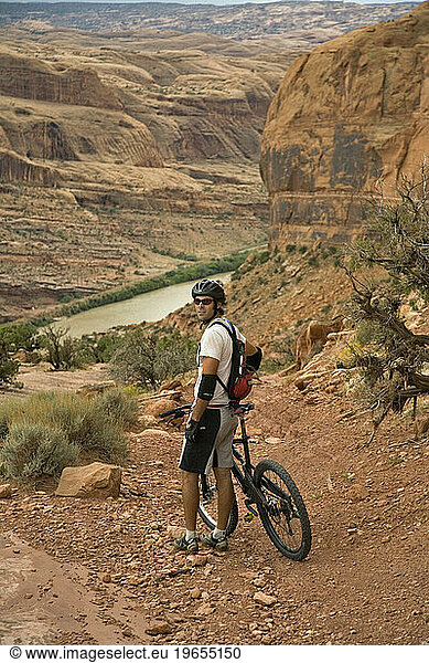 A man mountain biking in Moab  Utah.