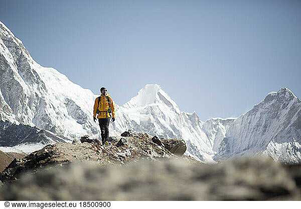 A man treks over the Khumbu glacier near Everest Base Camp.