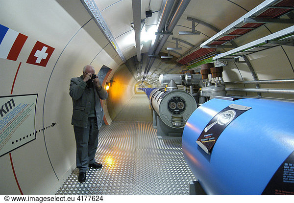 A man visits the model of a particle accelerator  CERN  Geneva  Switzerland