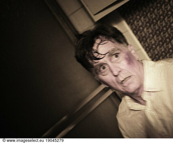 A man with a surprised look on his face.