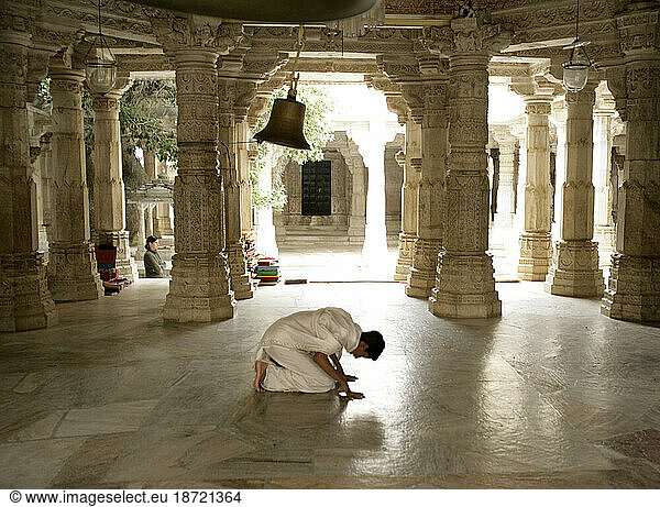 A man worships at the Jain Temple in Ranakpur  India