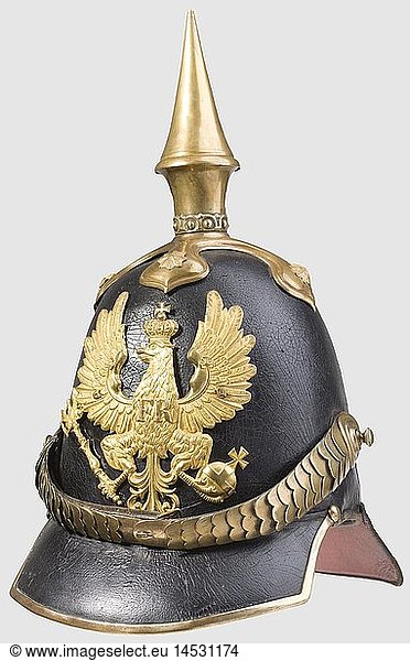 A model 1842 helmet for infantry officers  Black-lacquered leather skull  gilt fittings. Eagle in vivid original gilding with polished edges. Cambered chinscales  leather cockade. Green/red lined visors  leather lining. Original in all pieces. Excellent condition. Provenance: Karl Moser Collection  historic  historical  19th century  Prussian  Prussia  German  Germany  militaria  military  object  objects  stills  clipping  clippings  cut out  cut-out  cut-outs  helmet  helmets  headpiece  headpieces  utensil  piece of equipment  utensils  protection  headgear  headgears  uniform  uniforms