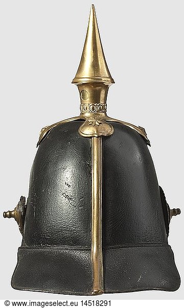 A model 1842 helmet for 'Landwehr' infantry officers  Tall leather skull  gilded mountings. Line eagle charged with a silver-plated Landwehr cross. Convex metal chinscales on screw bolts. Officer's metal cockade. Green and red covered peaks. Sheepskin lining  historic  historical  19th century  Prussian  Prussia  German  Germany  militaria  military  object  objects  stills  clipping  clippings  cut out  cut-out  cut-outs  helmet  helmets  headpiece  headpieces  utensil  piece of equipment  utensils  protection  headgear  headgears  uniform  uniforms