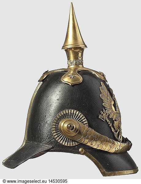 A model 1842 helmet for 'Landwehr' infantry officers  Tall leather skull  gilded mountings. Line eagle charged with a silver-plated Landwehr cross. Convex metal chinscales on screw bolts. Officer's metal cockade. Green and red covered peaks. Sheepskin lining  historic  historical  19th century  Prussian  Prussia  German  Germany  militaria  military  object  objects  stills  clipping  clippings  cut out  cut-out  cut-outs  helmet  helmets  headpiece  headpieces  utensil  piece of equipment  utensils  protection  headgear  headgears  uniform  uniforms