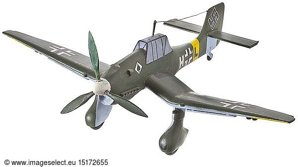 A model of the Junkers Ju 87 B 'Stuka' Holzmodell des legendÃ¤ren Sturzkampfbombers. Einfache  farbig bemalte AusfÃ¼hrung mit beweglichem Propeller. Kleine Fehlstellen. LÃ¤nge 28 5 cm. historic  historical  Air Force  branch of service  branches of service  armed service  armed services  military  militaria  air forces  object  objects  stills  clipping  clippings  cut out  cut-out  cut-outs  20th century
