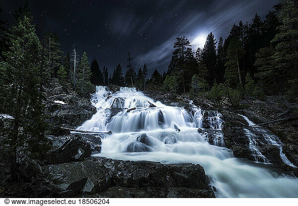A moonlit night view of Glen Alpine Falls in South Lake Tahoe  CA.