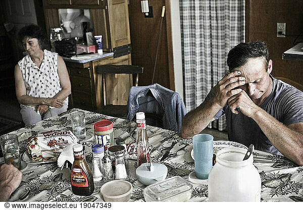 A mother and son eating lunch in their farm house in Keymar  Maryland .