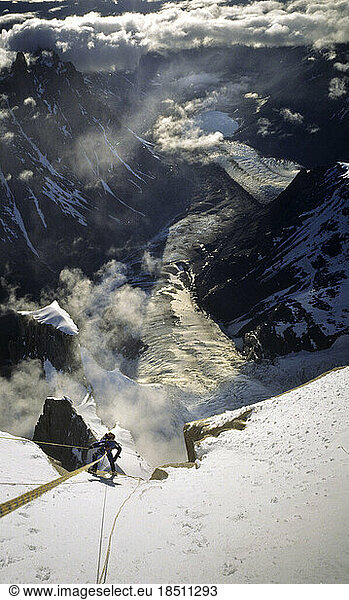 A mountaineer rappels down Cerro Torre's south east ridge after an ascent of the peak in Argentine Patagonia