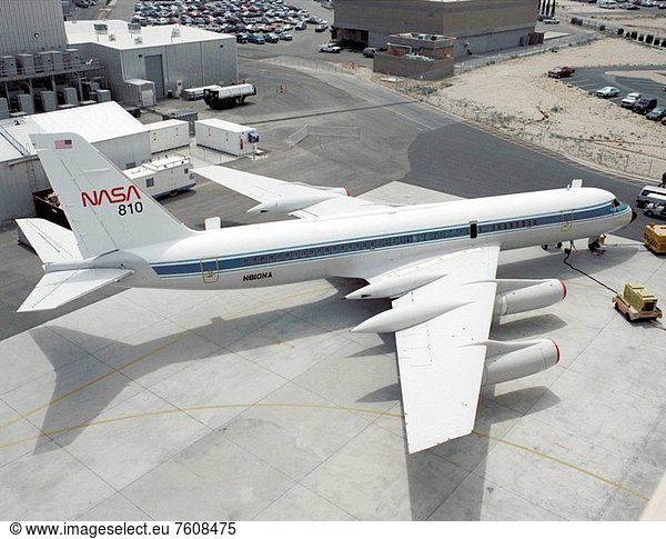 A NASA CV_990  modified as a Landing Systems Research Aircraft LSRA  is serviced on the ramp at NASA´s Dryden Flight Research Center  Edwards  California  before a test of the space shuttle landing gear system. The space shuttle landing gear test unit  operated by a high_pressure hydraulic system  allowed engineers to assess and document the performance of space shuttle main and nose landing gear systems  tires and wheel assemblies  plus braking and nose wheel steering performance. The series of 155 test missions for the space shuttle program provided extensive data about the life and endurance of the shuttle tire systems and helped raise the shuttle crosswind landing limits at Kennedy.