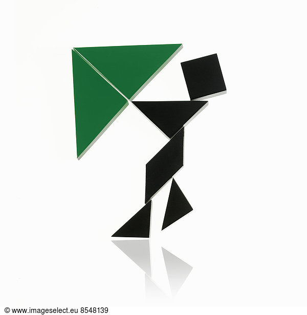 A number of triangles  squares and shapes arranged to represent a human being  in motion or action.