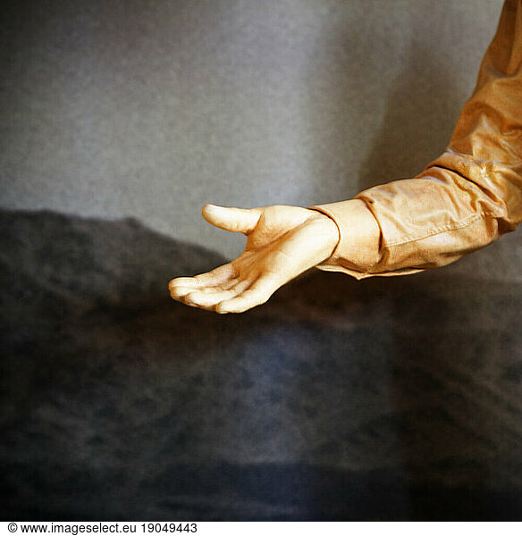 A open hand reaching out.