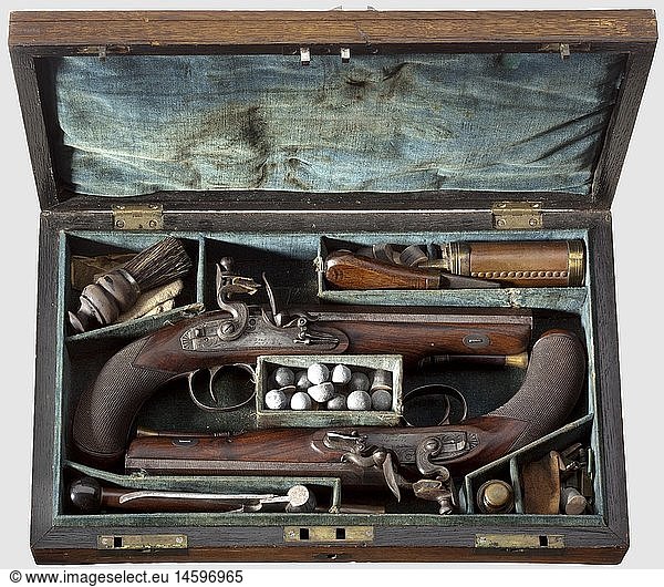 A pair of English flintlock pistols in their case  Richards  Wood & Co  London  circa 1810/20. Octagonal barrels made of twisted Damascus  smooth bores in 14 mm calibre. Dovetailed front sights  at the breeches marked 'London'. Inlaid silver band and engraved Akanthus frieze on barrel roots. Platinum-lined vents. Engraved locks with roller frizzen (one spring with repaired spot) and slide safety. On bolt plates engraved signature 'Richards Wood & Co.'. Walnut stocks with finely cut checkering and engraved iron furniture. Vacant silver escutcheon  wooden ramrods with brass tips. Length 29.5 cm each. In oak wood case with brass fittings. Folding handle on lid  front-side lock (key enclosed) and two bolts. Inside lined with blue velvet. Complete  extensive accessories consisting of powder flask  screwdriver  wad historic  historical  19th century  civil handgun  civil handguns  handheld  gun  guns  firearm  fire arm  firearms  fire arms  weapons  arms  weapon  arm  object  objects  stills  clipping  clippings  cut out  cut-out  cut-outs