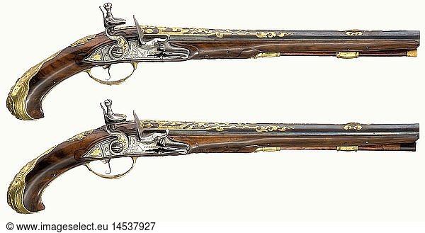 A pair of fine flintlock pistols  Johann Jacob Behr in Maastricht/LiÃ¨ge  circa 1730. Blued  round  smooth bore barrels in 15 mm calibre with raised sighting flats. The tops of the barrels are engraved and gilded with decorative scrolls and vines. Signed 'I.I. Behr' on the barrel ribs. Finely engraved flintlocks with more signatures and engraved  gold-inlaid decoration. Walnut full stocks with small repairs in places. Fire-gilded furniture with rich relief decoration. Engraved 'Bongarde Ã  Dusseldorp - Churf.Carlp' next to one trigger guard. Slightly different ramrods. Length of each 51 cm. Johann Jacob Behr was active ca. 1690 - 1740. Originally from WÃ¼rzburg  he worked later in Maastricht and LiÃ¨ge. Cf. StÃ¶ckel p. 77. historic  historical  18th century  civil handgun  civil handguns  handheld  gun  guns  firearm  fire arm  firearms  fire arms  weapons  arms  weapon  arm  object  objects  stills  clipping  clippings  cut out  cut-out  cut-outs