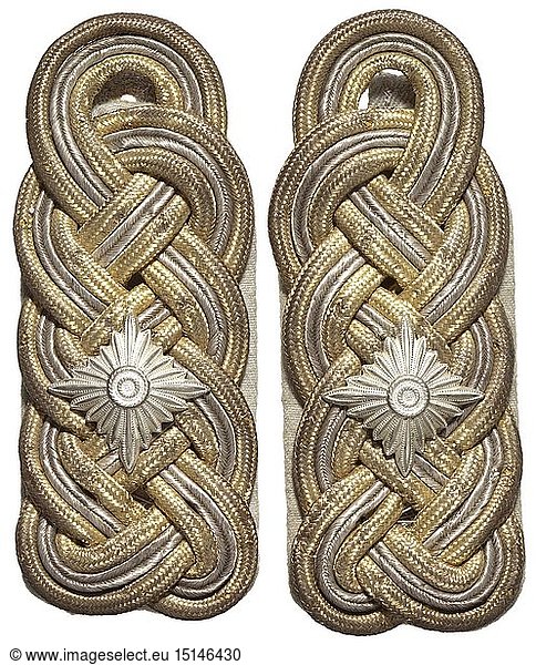 A pair of shoulder boards for 'SS-GruppenfÃ¼hrer' and 'Generalleutnant'of the Waffen-SS Gold-silver interwoven cords on mouse-grey wool underlay (heavy type)  with rear loop  used. historic  historical  20th century  1930s  1940s  Waffen-SS  armed division of the SS  armed service  armed services  NS  National Socialism  Nazism  Third Reich  German Reich  Germany  military  militaria  utensil  piece of equipment  utensils  object  objects  stills  clipping  clippings  cut out  cut-out  cut-outs  fascism  fascistic  National Socialist  Nazi  Nazi period