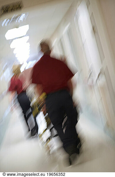 A patient rushed down the hall at a nursing home  Connecticut. (blur)