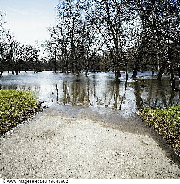 A paved road ends due to the flooding.