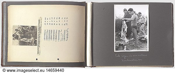 A photo album for a Wehrmacht UDT swimmer  small naval combat forces command An inscribed photo album of the training and employment of German UDT swimmer in the Second World War. Twenty-six original large format photos (13 x 18 cm) inscribed on the backs  taken by the famous war reporter 'Helmut Berndt'. Comes with fifteen newspaper cuttings from 1944 of photographs published at the time. Extremely rare as copies were not released. Outstanding photo material for the training and employment of German UDT swimmer  historic  historical  people  1930s  20th century  navy  naval forces  military  militaria  branch of service  branches of service  armed forces  armed service  object  objects  stills  clipping  clippings  cut out  cut-out  cut-outs