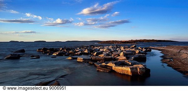 A picturesque archipelago consists of 50 islands and is located in the northern part of the Ladoga lake. There is an ancient monastery there. Valaam is also famous for various cultural natural objects: gardens  parks  avenues. In the picture: during dry summer - stone shoal.