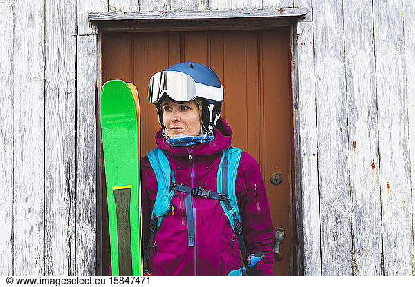 A portrait of a female skier.