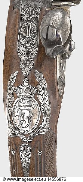A princely flintlock pistol from the possessions of Friedrich Franz I  Grand Duke of Mecklenburg (1775 - 1837).  Griecke in Ludwigslust  circa 1810. Octagonal barrel lightly constricted in the middle  with original bluing. Smooth bore in 12 mm calibre. Dovetailed silver front sight. The number '2' is engraved on the muzzle  and the signature  'Griecke in Ludwigslust' is engraved on top of the barrel. Finely engraved tang. Flintlock with waterproof pan and frizzen with rollers. The engraved lockplate bears an additional signature. Walnut full stock with bone nose cap. Finely engraved silver furniture  with the crowned cipher 'FF' in a laurel wreath on the back of the grip. Beautifully carved grip set with fine silver pins. Original ramrod with bone tip. Length 34 cm. Griecke  known as a gunsmith in Ludwigslust/Mecklenburg ca. 1760 - 1820. Cf. StÃ¶ckel  p. 456. historic  historical  19th century  civil handgun  civil handguns  handheld  gun  guns  firearm  fire arm  firearms  fire arms  weapons  arms  weapon  arm  object  objects  stills  clipping  clippings  cut out  cut-out  cut-outs