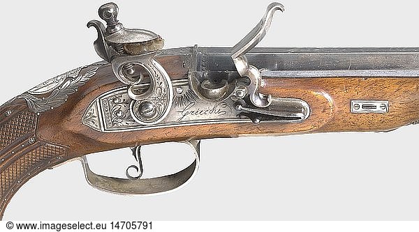 A princely flintlock pistol from the possessions of Friedrich Franz I  Grand Duke of Mecklenburg (1775 - 1837).  Griecke in Ludwigslust  circa 1810. Octagonal barrel lightly constricted in the middle  with original bluing. Smooth bore in 12 mm calibre. Dovetailed silver front sight. The number '2' is engraved on the muzzle  and the signature  'Griecke in Ludwigslust' is engraved on top of the barrel. Finely engraved tang. Flintlock with waterproof pan and frizzen with rollers. The engraved lockplate bears an additional signature. Walnut full stock with bone nose cap. Finely engraved silver furniture  with the crowned cipher 'FF' in a laurel wreath on the back of the grip. Beautifully carved grip set with fine silver pins. Original ramrod with bone tip. Length 34 cm. Griecke  known as a gunsmith in Ludwigslust/Mecklenburg ca. 1760 - 1820. Cf. StÃ¶ckel  p. 456. historic  historical  19th century  civil handgun  civil handguns  handheld  gun  guns  firearm  fire arm  firearms  fire arms  weapons  arms  weapon  arm  object  objects  stills  clipping  clippings  cut out  cut-out  cut-outs