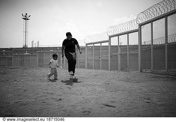 A prisoner plays soccer in a female penitentiary prison yard in Mexico  D.F.