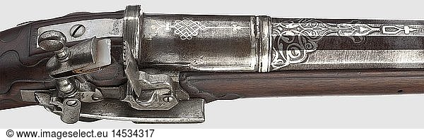 A rare heavy miquelet-lock gun  South German or Austrian  early 18th century  earlier Ottoman barrel from the 17th century. The extremely heavy Damascus barrel in 23 mm calibre is round over the breeches  then faceted and then round again  segmented by girdles and with rich silver inlays on top  a later brass front sight and a typical Ottoman peep sight. Florally engraved miquelet-lock. Carved walnut full stock with iron furniture  few horn inlays at the butt  behind the trigger guard a stamp with the coat of arms of the Salm family as well as the number '54'. The iron ramrod supplemented. Cracks at the forestock and at the butt. Length 131 cm. The barrel is possibly part of the capture from the Turks' second Siege of Vienna in 1683. Provenance: The Royal Armoury Salm-Reifferscheidt-Dyck  Christie's auction catalogue 1992  historic  historical  18th century  civil long guns  gun  weapons  arms  weapon  arm  firearm  fire arm  gun  fire arms  firearms  guns  object  objects  stills  clipping  clippings  cut out  cut-out  cut-outs