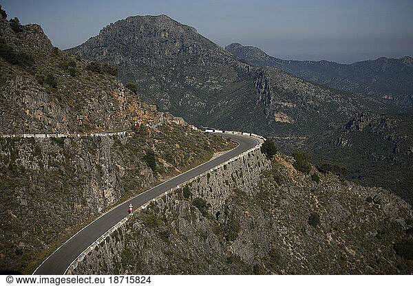 A road in the mountains of Sierra de Grazalema National Park  Cadiz province  Andalusia  Spain.