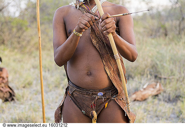 A San Bushman holding bow and arrow  Kalahari Desert