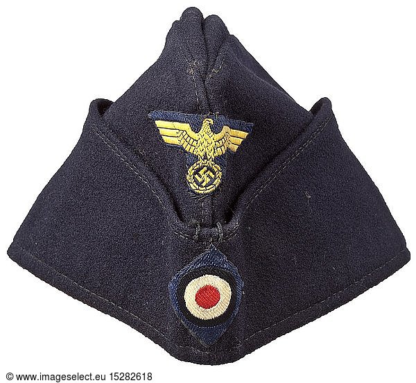 A 'Schiffchen' on-board cap for enlisted men/NCOs of the Kriegsmarine Navy-blue woollen cloth  black inner liner with illegible depot- and size stampings  BeVo weave insignia on dark blue ground. In lightly used condition. historic  historical  navy  naval forces  military  militaria  branch of service  branches of service  armed forces  armed service  object  objects  stills  clipping  clippings  cut out  cut-out  cut-outs  20th century