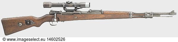 A scope rifle 98 k  code '237 - 1939'  with short side mount and scope ZF Kahles  8 x 57 cal.  no. 2242c. Matching numbers including screws. Mirror-like bore. Produced by Berlin-LÃ¼becker Maschinenfabrik  LÃ¼beck. Various acceptance marks eagle/'214'. Thin  spotted finish on all parts. Dark laminated stock complete with strap and cleaning rod. Good overall condition. Mounted: Scope 'K. Kahles Wien / H 4x60 / 40642'  reticule 1  lens shade  range setting scaled 1 - 8. On left side of barrel between the two rings a soldered and screwed down piece of steel to stop scope from moving on its own (forerunner to 'blow-back ring'). Scope technically and optically in good order. Spotted bluing. Mount with sixfold screwed-on rib without inscription or number. Spotted finish. Scope and mount in very good overall condition. Length 110 cm. Erwerbsscheinpflichtig. historic  historical  1930s  20th century  ordnance weapon  service weapon  weapons  arms  weapon  arm  militaria  German  Germany  firearm  fire arm  gun  fire arms  firearms  guns  object  objects  stills  clipping  clippings  cut out  cut-out  cut-outs