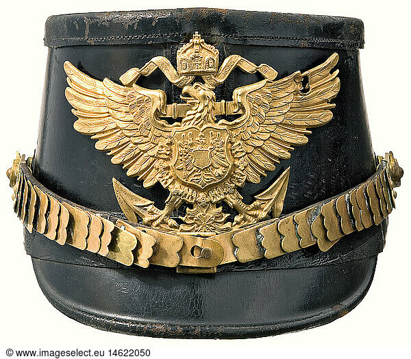 A shako for marines.  Private purchase. Black lacquered leather body. Gilded eagle plate and metal chinscales (one link replaced). Field insignia missing. Brown ribbed silk lining. Leather sweatband. Beautiful condition. historic  historical  1900s  1910s  20th century  navy  naval forces  military  militaria  branch of service  branches of service  armed forces  armed service  object  objects  stills  clipping  clippings  cut out  cut-out  cut-outs  uniform  uniforms  piece of clothing  clothes  outfit  outfits  helmet  helmets  cap  caps  headpiece  headpieces