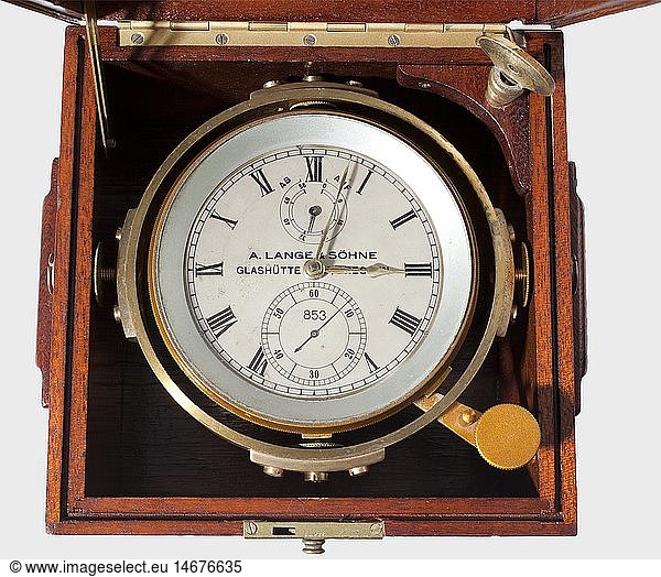 A ship's chronometer  by the company 'A. Lange & SÃ¶hne - GlashÃ¼tte B/Dresden'. Silver-plated dial with black  big hour circle and marks  brass hands  56-hour power reserve dial at the 12 and small seconds dial with serial number '853' at the 6 o'clock position  blued hands. Brass case (matching numbers) and gimbal with protection varnish. Complete with key. In a wooden box with label (matching numbers). Not tested for function. historic  historical  1930s  1930s  20th century  navy  naval forces  military  militaria  branch of service  branches of service  armed forces  armed service  object  objects  stills  clipping  clippings  cut out  cut-out  cut-outs  utensil  piece of equipment  utensils  item  items