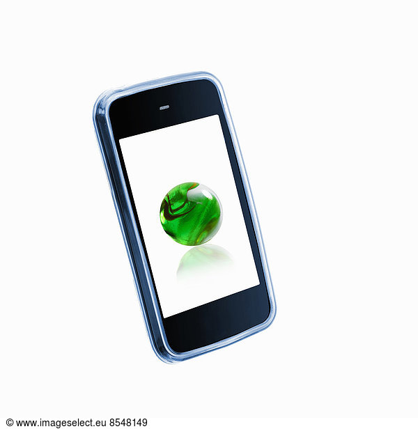 A small handheld communication device or phone with a green globe or sphere on the screen.